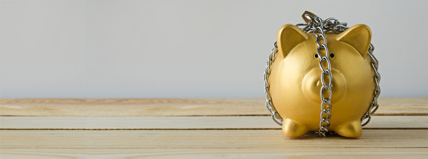 photo of a piggy bank with chain surrounding it, showing a down payment of a minimum of 5% for the purchase of a property in the Edmonton area